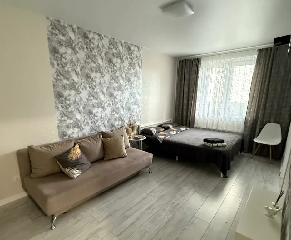 Современная квартира в новом жилом комплексе рядом с въездом в город