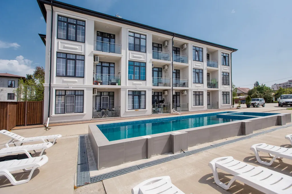 Квартира Квартира Уютный апартамент со своей придомовой территорией и бассейном — Сириус