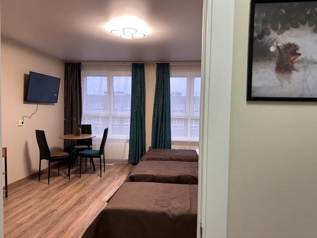 Студия с тремя раздельными кроватями