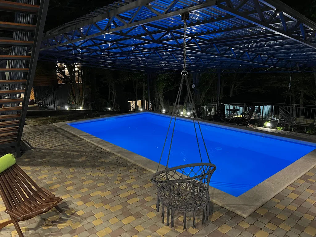 Домик в лесу у моря с верандой