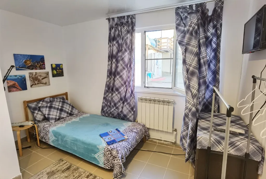 Уютная комната недалёко от моря, удобства в номере