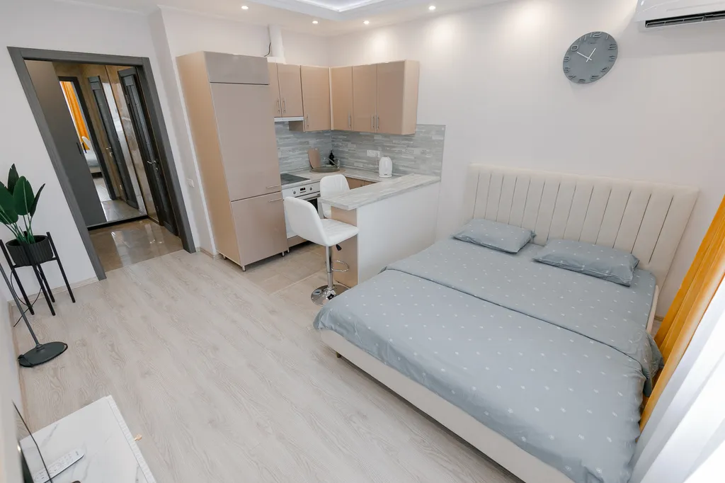 Красивая нежная студия со всеми удобствами