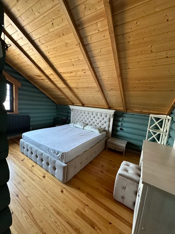 Дом из бруса на берегу моря с зоной барбекю и собственной парной