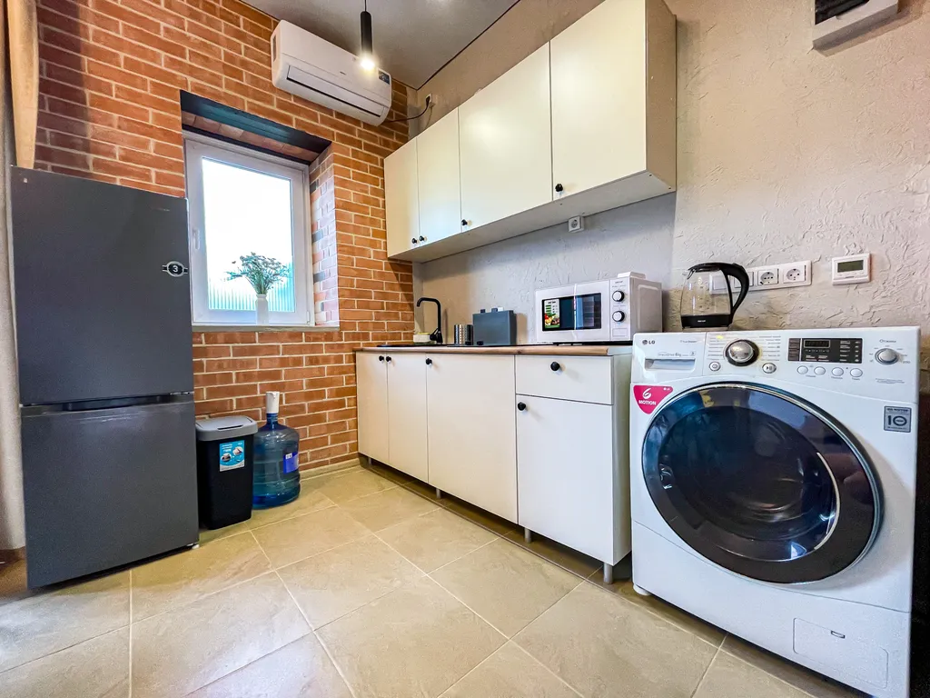 Большие апартаменты с кухней и стиральной машиной на берегу моря