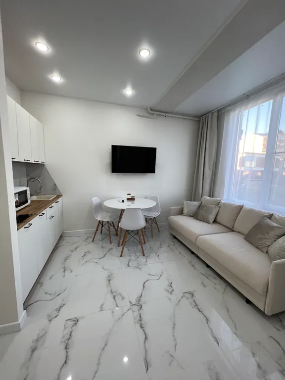 Квартира Квартира Уютная студия с балконом — Сириус