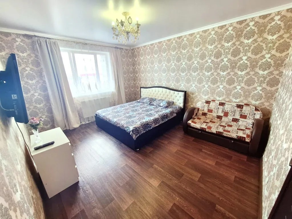 Квартира с двумя балконами на выезде