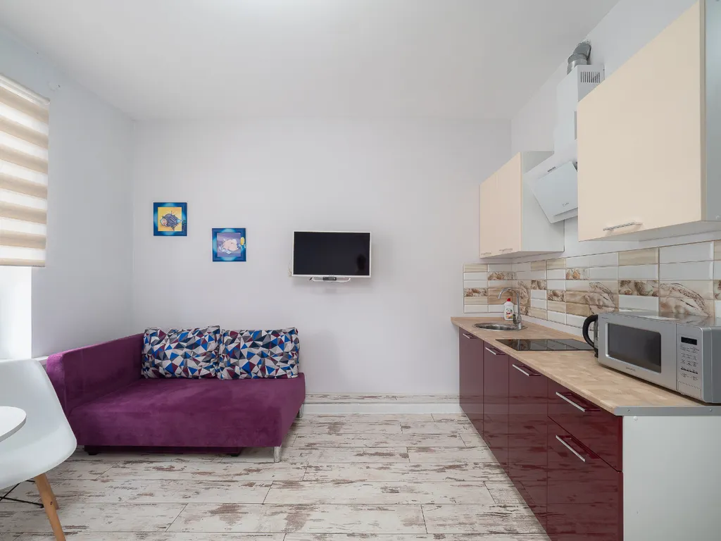 Квартира Квартира Уютная студия у моря с теплым бассейном — Сириус