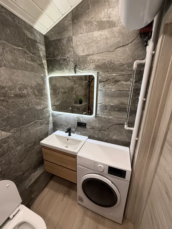 Одноэтажный двухкомнатный дом БарнХаус в черте города