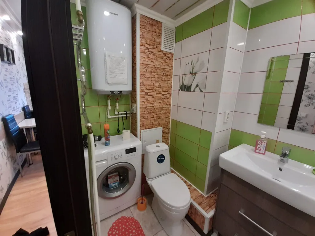 Квартира с балконом и видом на город