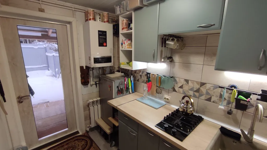 Часть дома с участком в центре города