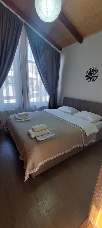 Коттедж Трёхкомнатные апартаменты с видом на горы — Архыз