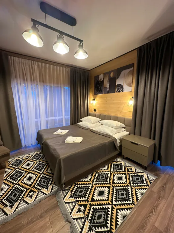 Квартира Уютные апартаменты с видом на двор — Архыз