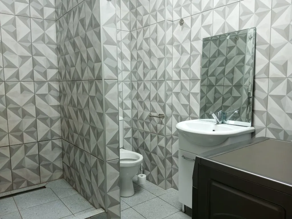 Семиместный номер с общей ванной комнатой