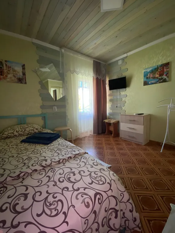 Четырехместный двухкомнатный номер с балконом с видом на горы