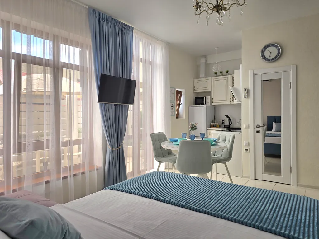 Квартира Квартира Уютная студия с выходом во дворик — Сириус