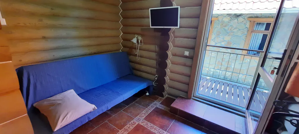 Квартира Двухместный номер с односпальной кроватью и двухспальным диваном — Нижняя Хобза