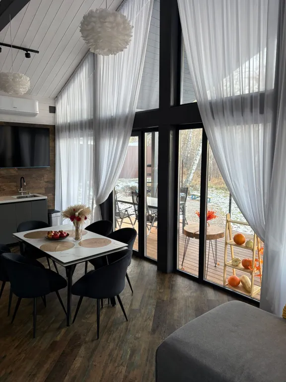 Дом Совы на вершине города