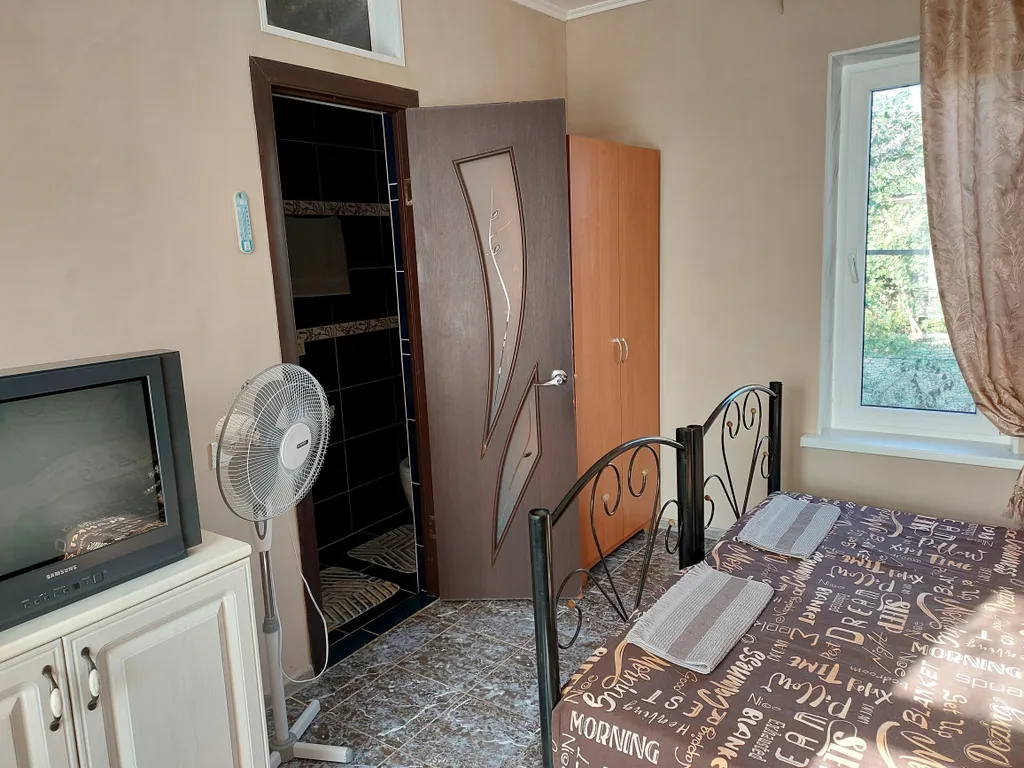 Уютный дом с видом на сад