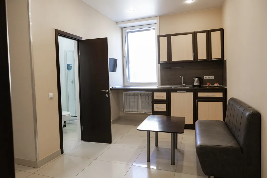 Семейный номер в отеле с мини-кухней