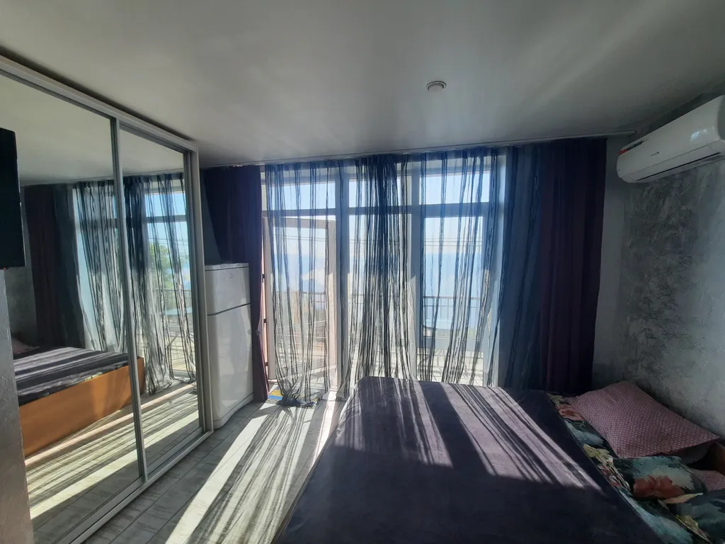 Комната с видом на море 11