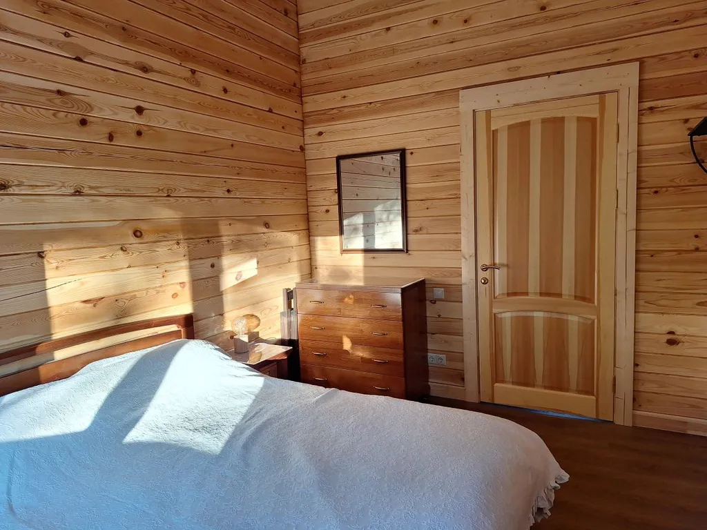 Коттедж на берегу реки в Рощино