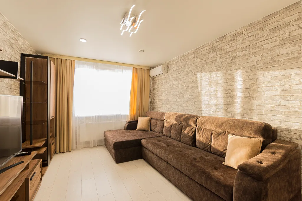 Уютная квартира в ЖК Паруса с подвесным креслом от Kravc Group