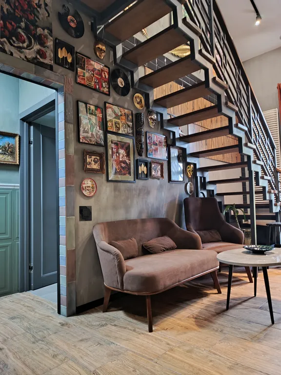 Атмосферная двухуровневая квартира с видом на Петропавловский парк