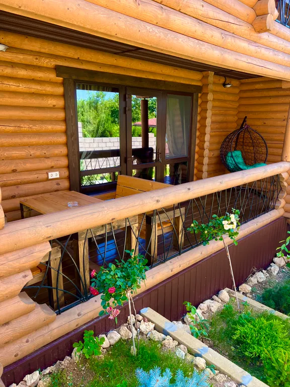 Семейные апартаменты Балдино в доме из сруба