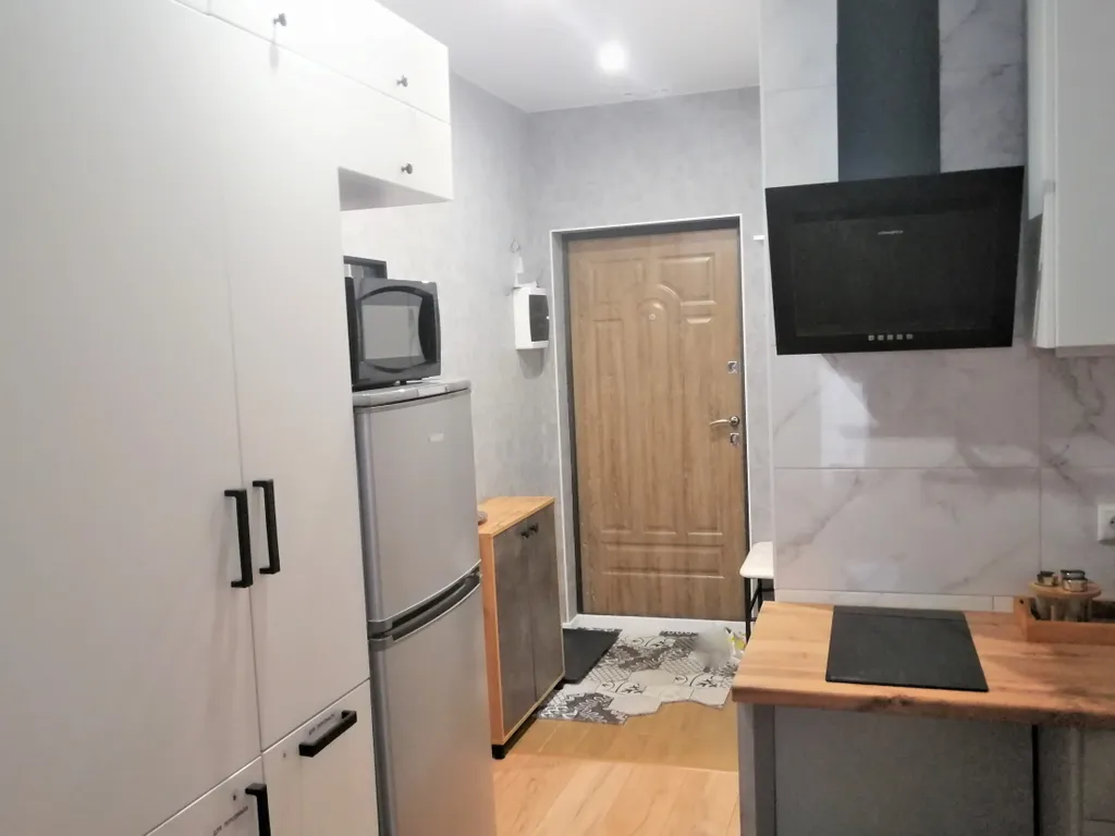 Студия loft с балконом