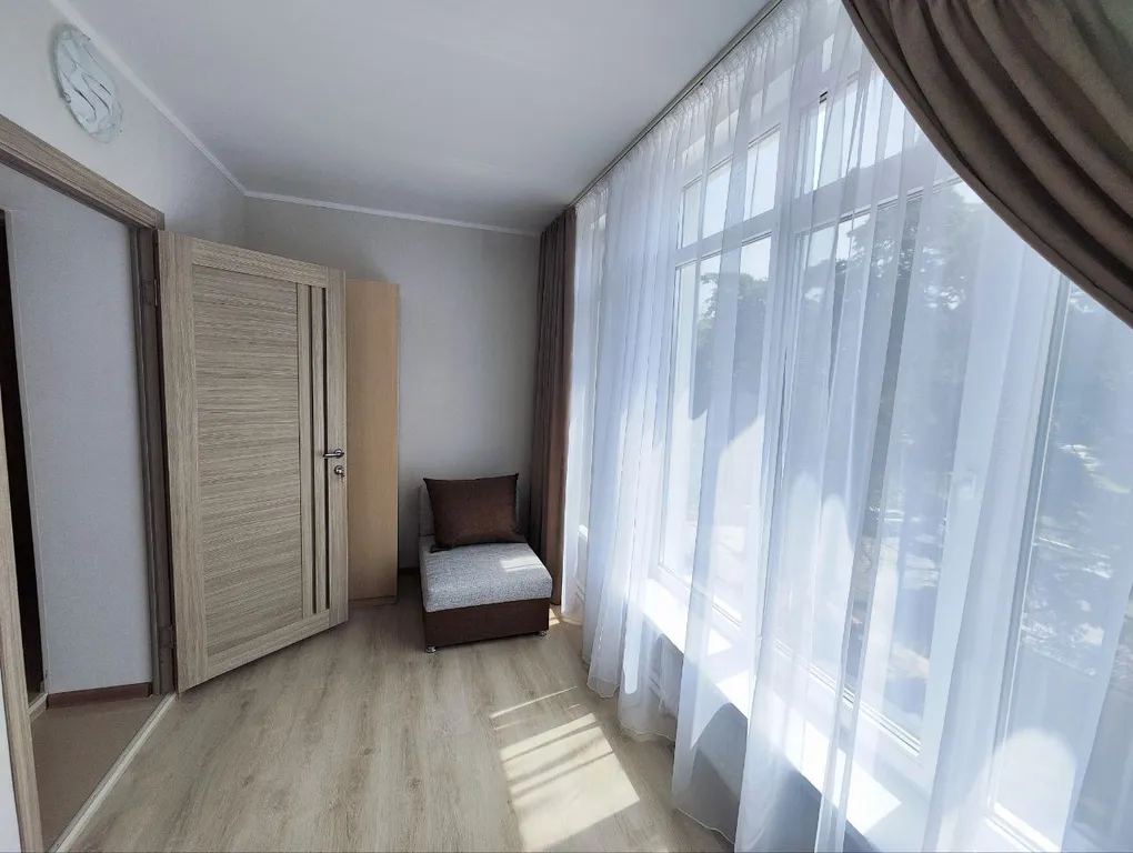 Семейный номер на мансарде в гостевом доме Регион 86