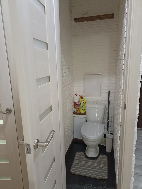 Квартира в центре на первом этаже с асфальтированной парковкой