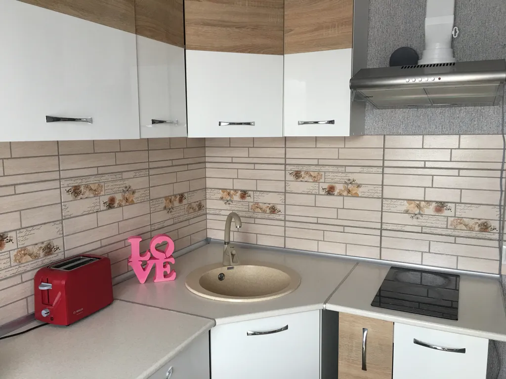 Четырехместная однокомнатная квартира с балконом в центре