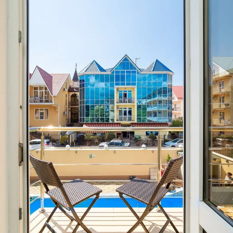 Квартира Квартира Уютная студия у моря с теплым бассейном — Сириус