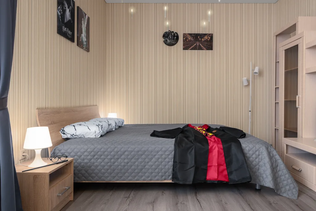 Уютная квартира с большой панорамной лоджией и видом на стадион