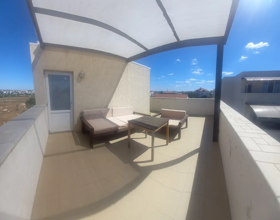 Двухуровневый номер с видом на море