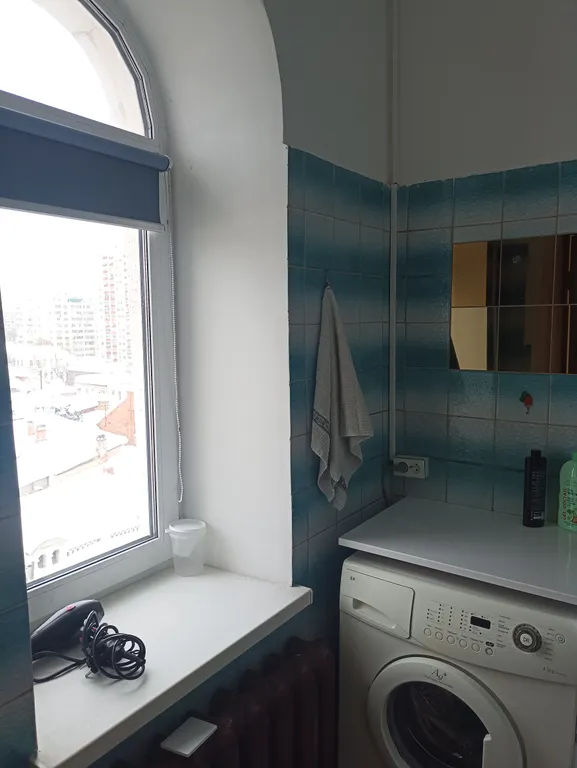 Мансарда в сталинке с арочными окнами