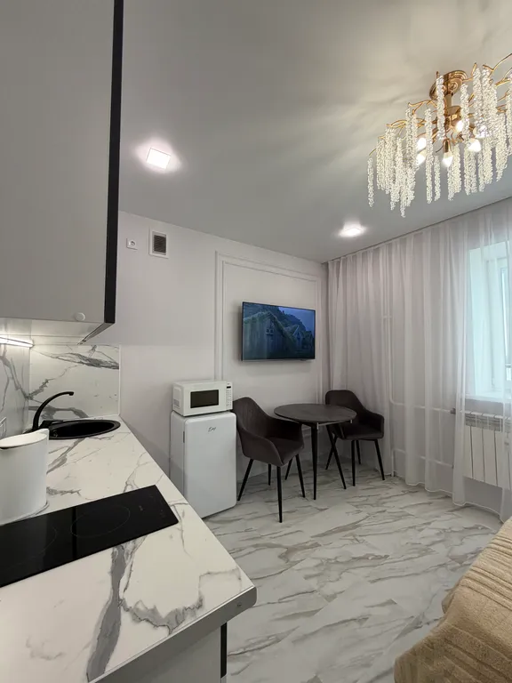 Уютная квартира-студия с шикарным, панорамным видом на город и Китай