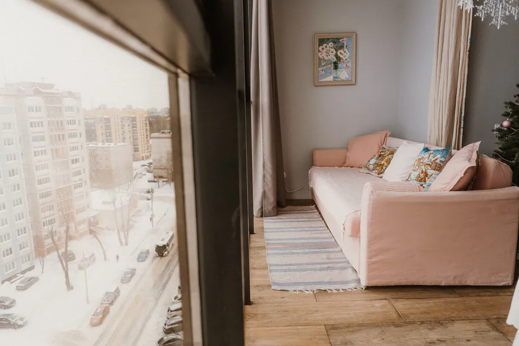 Дизайнерские апартаменты с панорамными окнами под крышей