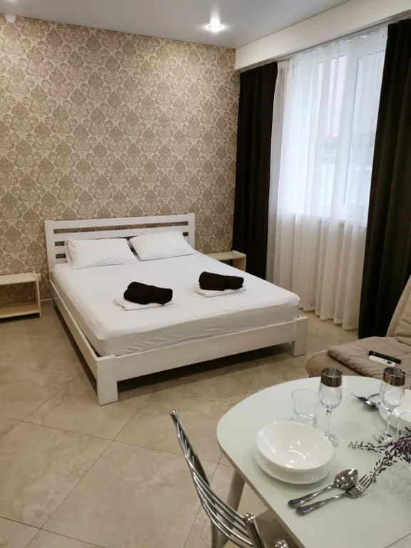 Квартира Квартира Уютная студия рядом с ТРЦ Мандарин — Сириус