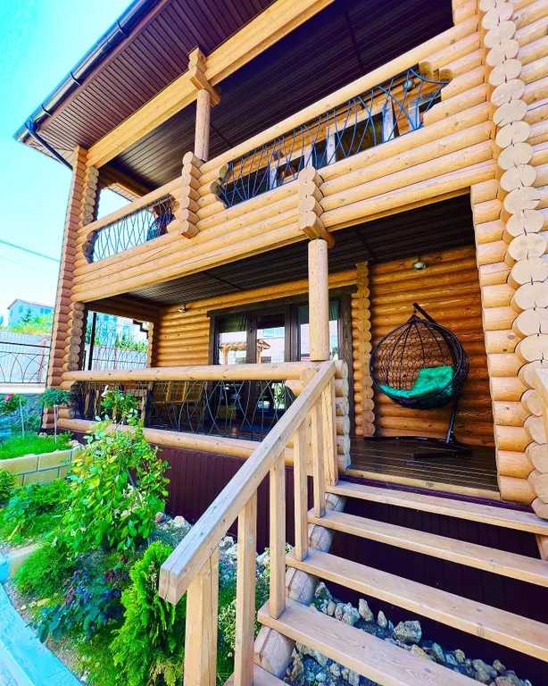 Семейные апартаменты Балдино в доме из сруба