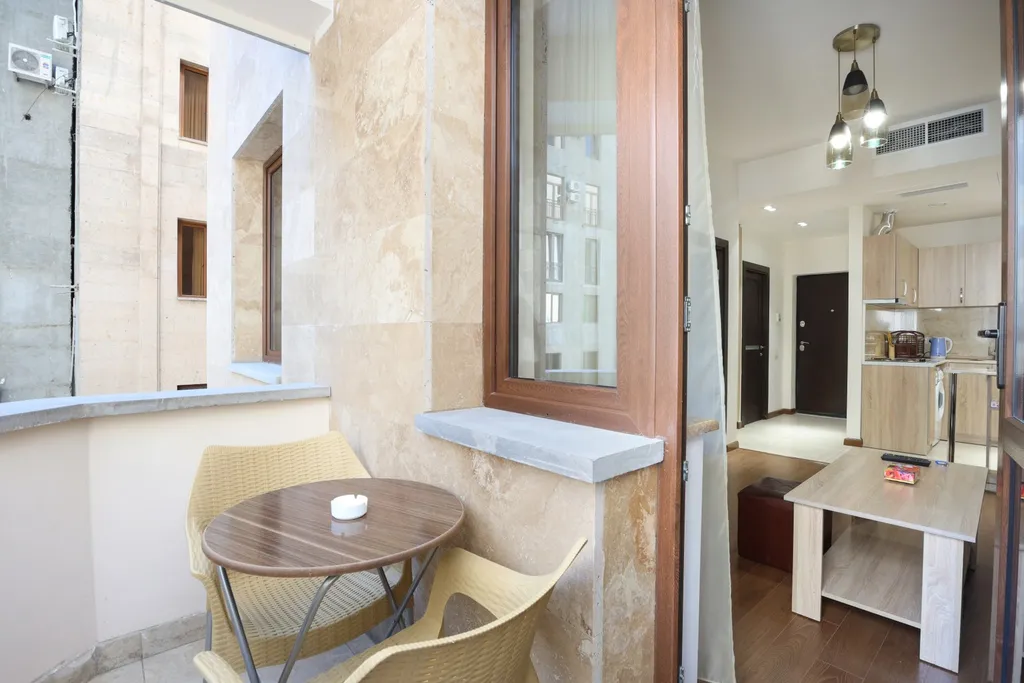 Квартира с 1 спальней и балконом в центре города