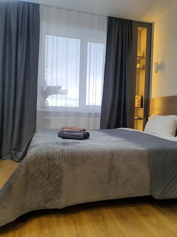 Уютная дизайнерская квартира с прекрасным видом из окна