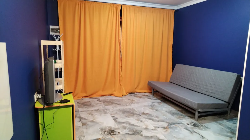 Уютная комната-студия в частном доме