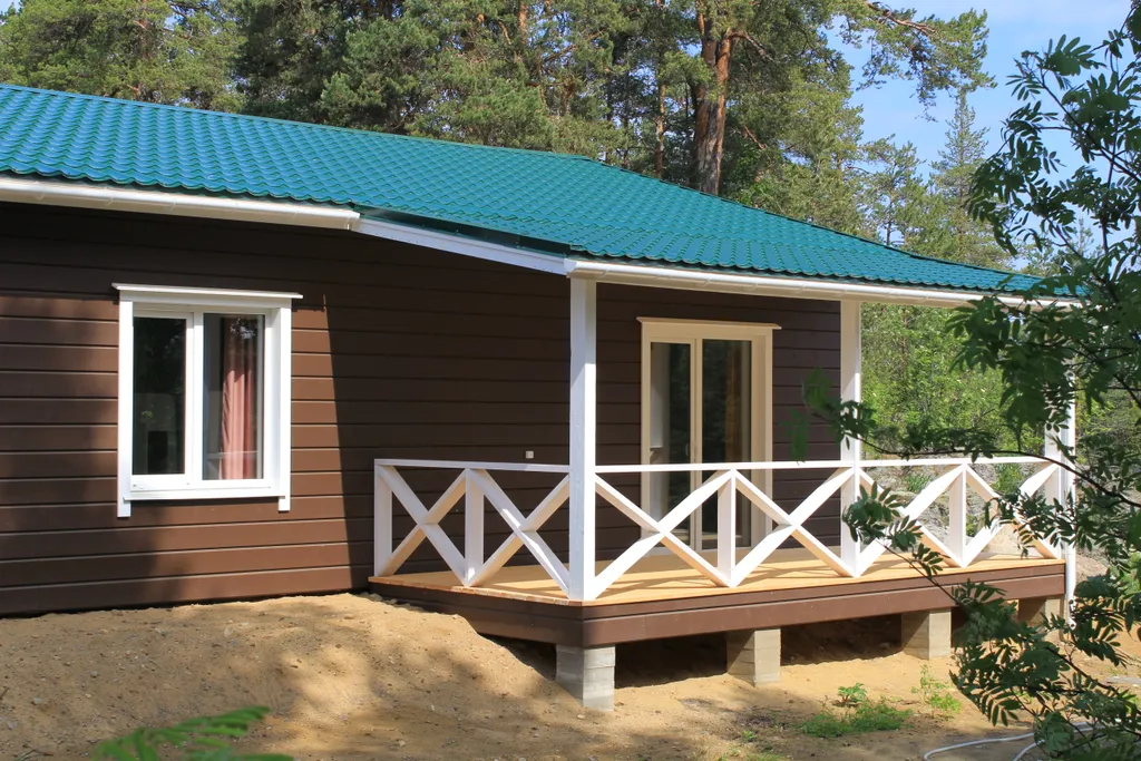 Коттедж с собственным пирсом и террасой на берегу Ладоги