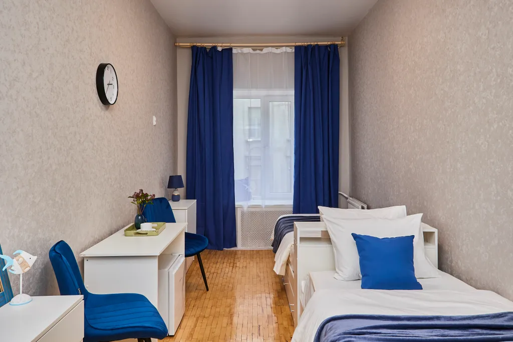 Уютный номер с двумя раздельными кроватями