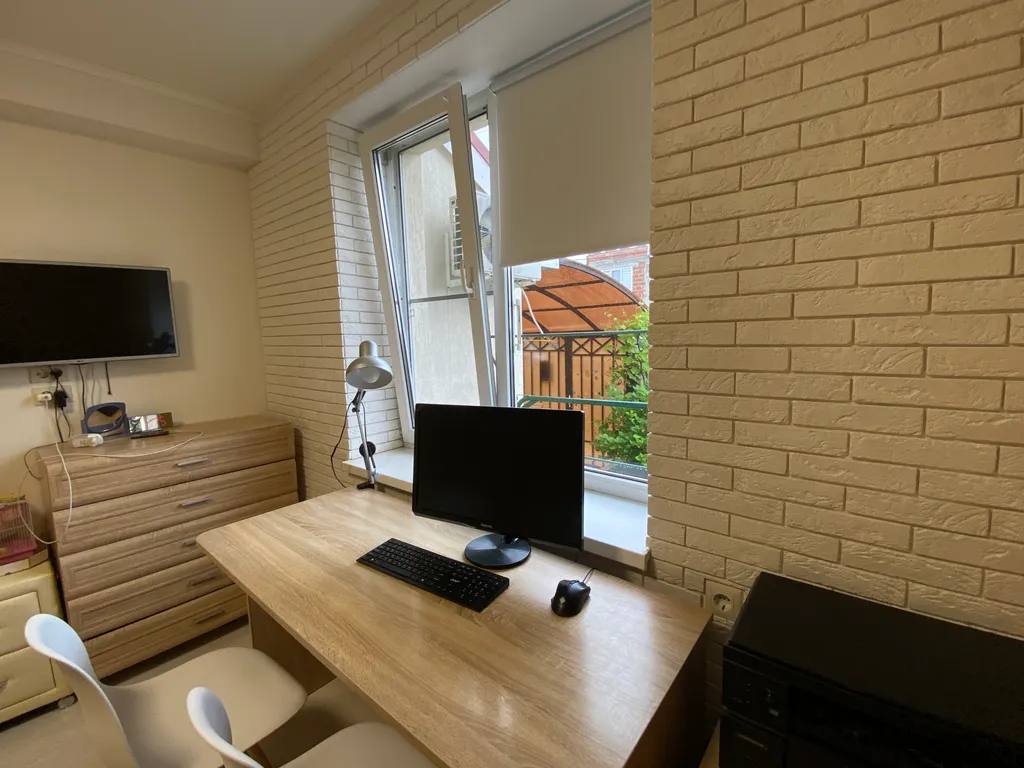 Дом возле Олимпийского парка с плодовым садом