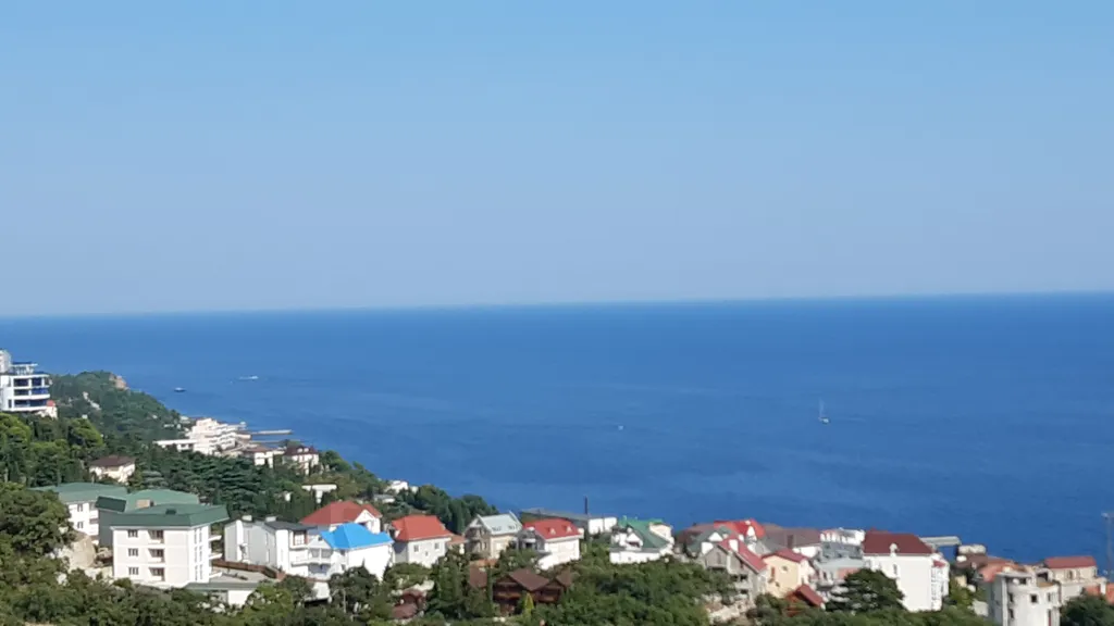 Квартира Квартира Современный апартамент с видом на море и парковкой — Ялта