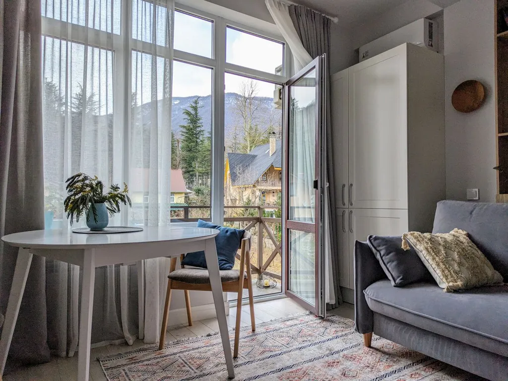 Двухуровневая квартира с балконом в центре