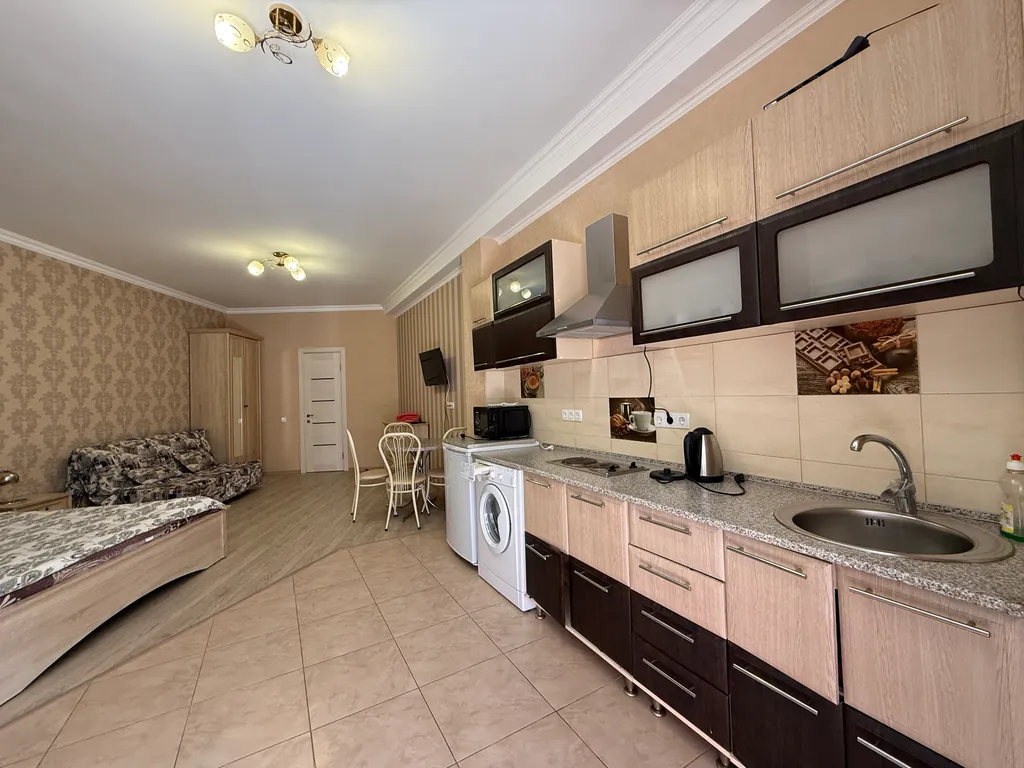 Студия с балконом зоной барбекю у моря