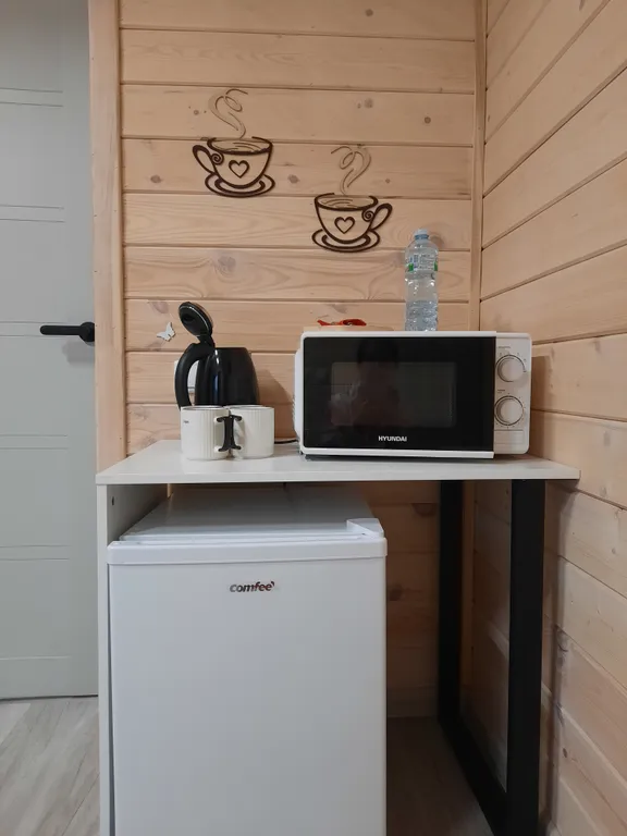 Уютный четырехместный Домик де-люкс с отдельными кроватями